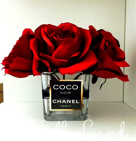 Chanel vase with roses